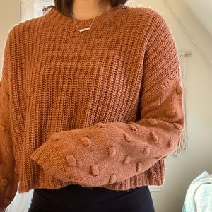 Orange textured sweater